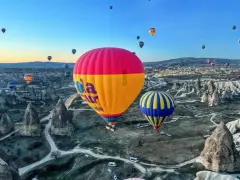 Goreme Valley Sunrise Hot Air Balloon Ride with Breakfast & Hotel Transfers